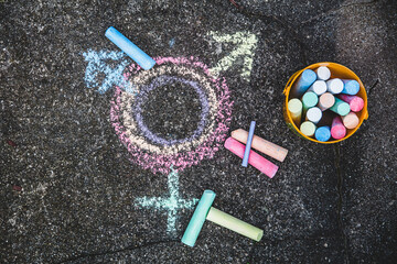 lgbt symbol painted with chalk on the street - obrazy, fototapety, plakaty