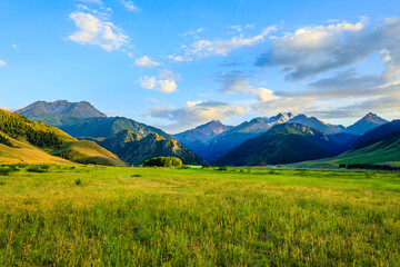 Obraz premium Magnificent mountain and green grassland in Xiata Scenic Area,Xinjiang,China.