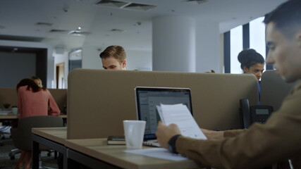 Businessman browsing internet on mobile phone. Employee typing on smartphone