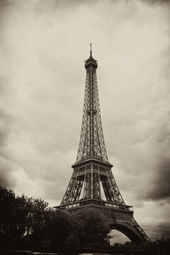Eiffel Tower in a sepia toned black and white.