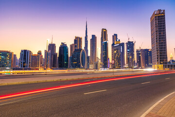 Fototapeta na wymiar Beautiful view of Dubai city skyscrapers or skyline captured from Marasi Drive at Business Bay District, Dubai, UAE.