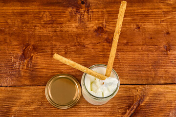 various dairy products in glass jars, organic products.