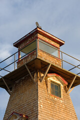 The square-tapered and shingled Cape Tryon Lighthouse on Prince Edward Island