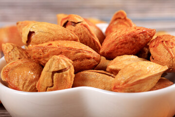 Badam, almonds is on the wooden table
