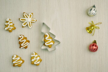 Closeup of fresh baked homemade  cookies. New Year holiday composition of decorations. Christmas background with Christmas gingerbread. Top view, copy space, flat lay.	