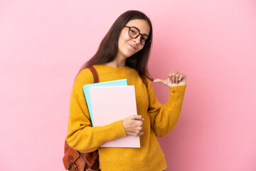 Young student woman over isolated background proud and self-satisfied