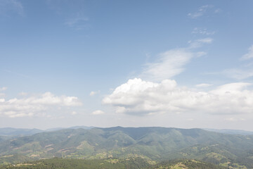 Fototapeta premium Fascinating panorama of sunset and landscape in the mountains on the hill, Ukrainian Carpathians mountains. Colored and their mountain landscapes. Nature concept