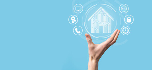 Hand hold house icon.Smart home controlled, intelligent house, and home automation app concept.Pcb...