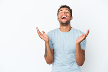 Young handsome Brazilian man isolated on white background smiling a lot