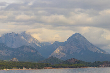 View of the Mediterranean sea coast and the Taurus mountains in Kemer, Antalya province in Turkey