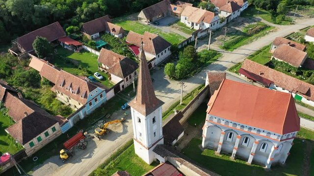 Cloaster, Romania - Summer flying drone aerial view of Saxon village in Transylvania