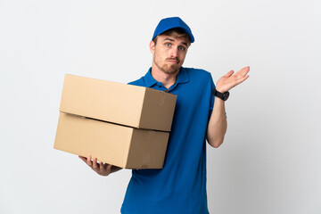 Young delivery blonde man isolated on white background having doubts while raising hands