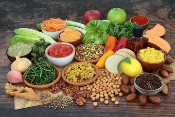 Vegan food for healthy lifestyle concept. Health foods high in protein, omega 3, vitamins, minerals, antioxidants, anthocyanins, fibre. Eco friendly, sustainable agriculture, mindful eating.