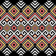 Ethnic pattern on. Black background, vector seamless pattern with yellow, pink, and white. Traditional geometric pattern design. Textile abstract pattern