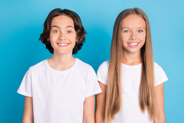Photo portrait children smiling in casual clothes isolated pastel blue color background