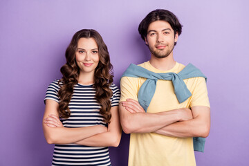 Photo of charming cute lovers dressed casual outfit arms crossed smiling isolated purple color background