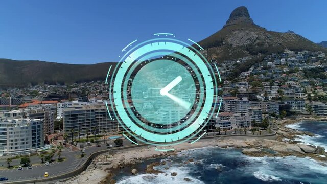 Animation of rotating hands on clock over mountain and modern coastal town