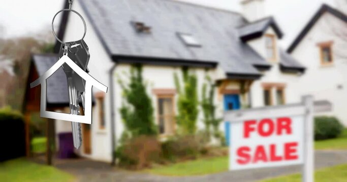 Animation of silver house key fob and key, hanging in front of blurred house with for sale sign