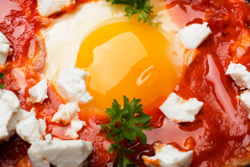 Egg with tomatoes close up
