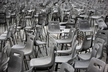Rows of seats or chairs. Empty chairs after the performance