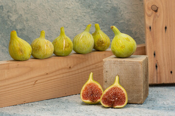 Sliced fresh figs in wooden box 