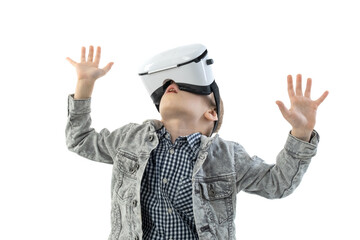 Young boy with virtual reality glasses isolated on white background. A child in emotional excitement wearing 3D glasses.