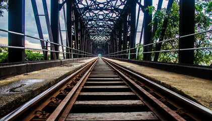 Railway tracks through the steel bride, The Manampitiya bridge in Sri Lanka, the second longest...