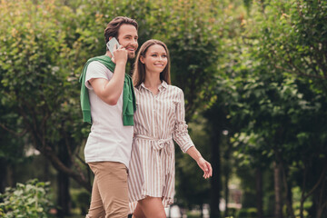 Fototapeta premium Photo portriat young couple smiling in summer wearing casual clothes man talking on mobile phone