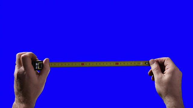 Hands Stretching Measuring Tape on Chroma Key Blue Screen - 4K