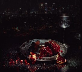 glass of red wine with pomegranate