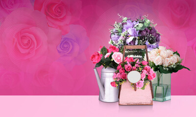 bouquet of pink roses placed on a wooden vase placed on a square glass vase purple roses on a stainless steel vase on blur roses on pink background, banner, template, copy space