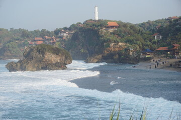 Mesra beach with a natural background. Mesra means intimate. Mesra beach also known as kukup beach or ngrawe beach