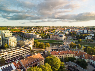 Fototapeta premium Beautiful Vilnius city panorama in autumn with orange and yellow foliage. Aerial evening view.