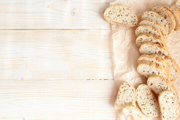 Obraz na płótnie Canvas Sliced bread with sesame and flax seeds