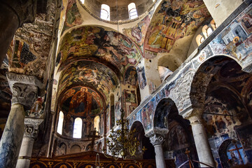 Mystras fortress and Byzantine city in Greece. Church interior and beautiful frescoes 