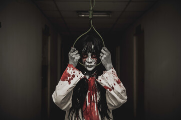 Portrait of asian woman make up ghost,Scary horror scene for background,Halloween festival...