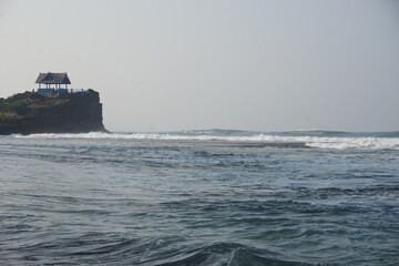 Mesra beach with a natural background. Mesra means intimate. Mesra beach also known as kukup beach or ngrawe beach