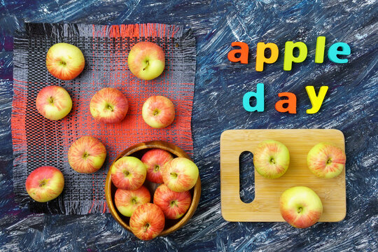 Apple is a national holiday on October 21. Red apples on a dark background. Top view
