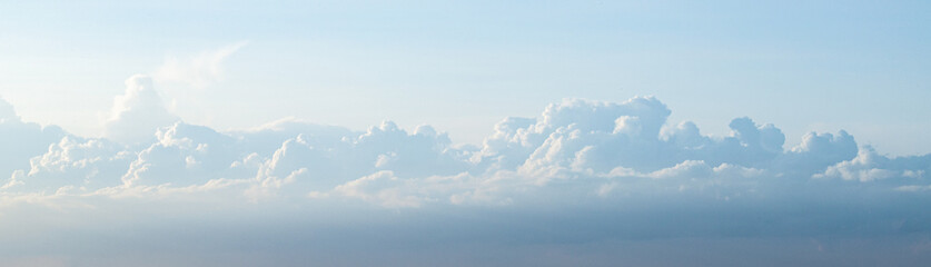 blue sky with white clouds and sun light. Nature background of sky	