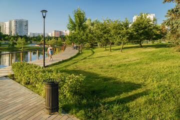 Summer sunset view of Yuzhnoe Butovo park in South Butovo district, Moscow, Russia.