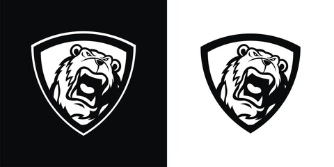 Black and white silhouette of a bear head mascot in a shield.
