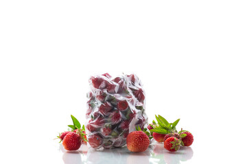 frozen fresh strawberries in a vacuum bag