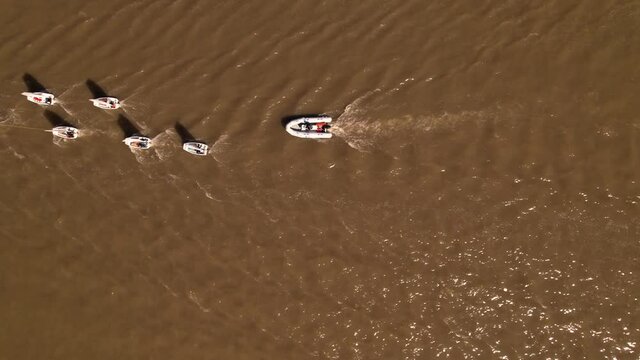 Aerial view of optimist boats, special boats for children. navigating the river.