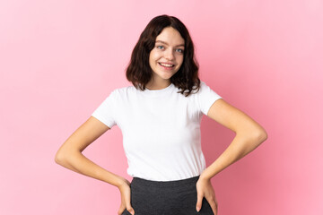 Teenager Ukrainian girl isolated on pink background laughing
