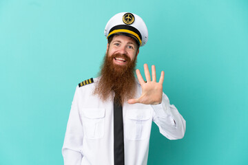 Redhead caucasian man playing rugby isolated on yellow background counting five with fingers