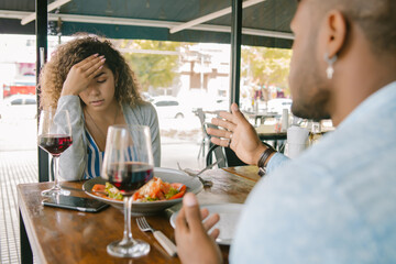 Couple having a date at a restaurant.