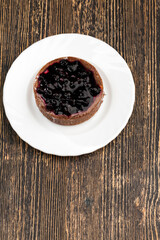 cake with butter cream and black currant jam