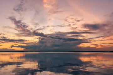 Fototapeta na wymiar The colorful sunset over the Minsk sea, Belarus. HDR-photo