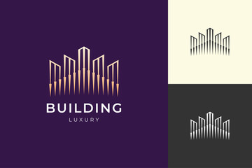 Fototapeta premium Property building or hotel logo in luxury gold color and futuristic