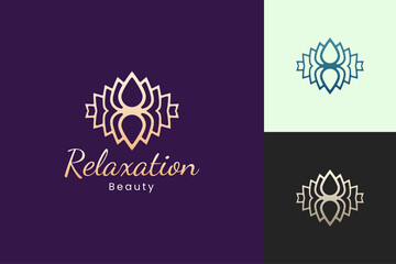 Luxury lotus flower logo in gold color for beauty spa or salon